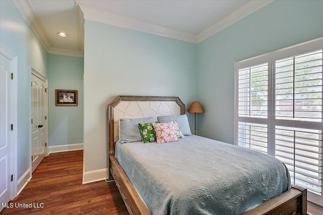bedroom with crown molding, recessed lighting, wood finished floors, and baseboards