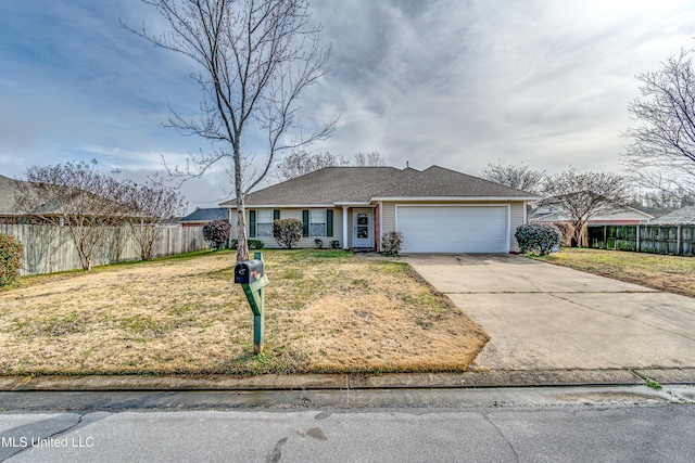 ranch-style home featuring a garage and a front lawn