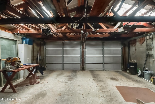 garage featuring a garage door opener