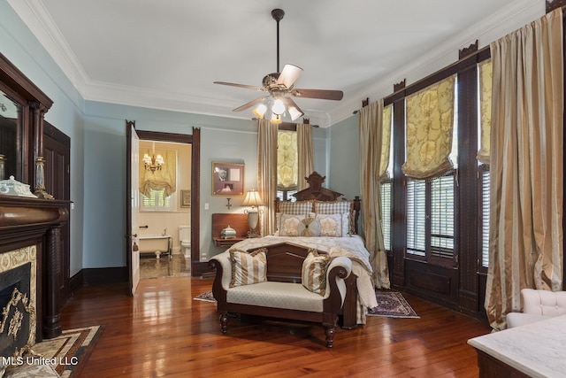 315 N St, Lexington, MS 39095 - bedroom with a ceiling fan, a premium fireplace, hardwood / wood-style floors, baseboards, and ornamental molding