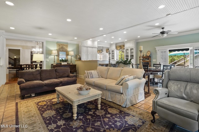 315 N St, Lexington, MS 39095 - living room featuring ceiling fan with notable chandelier, ornamental molding, and recessed lighting