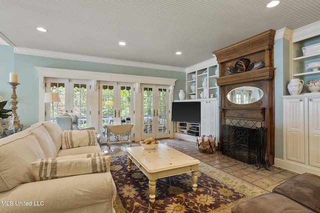 315 N St, Lexington, MS 39095 - living area featuring crown molding, a large fireplace, french doors, and recessed lighting