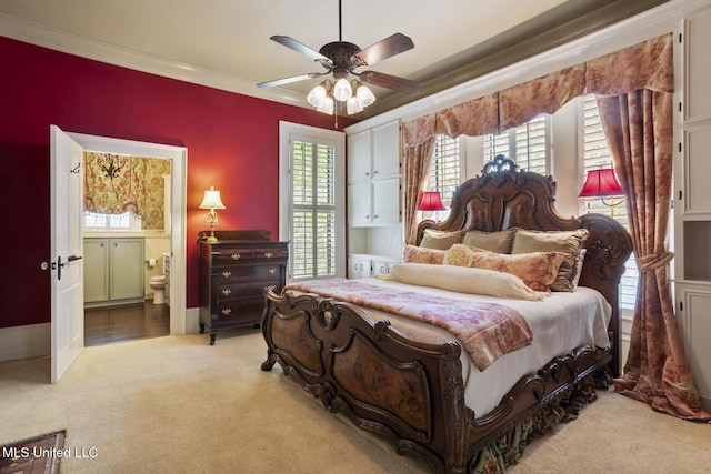315 N St, Lexington, MS 39095 - bedroom featuring crown molding, carpet flooring, ensuite bath, and a ceiling fan