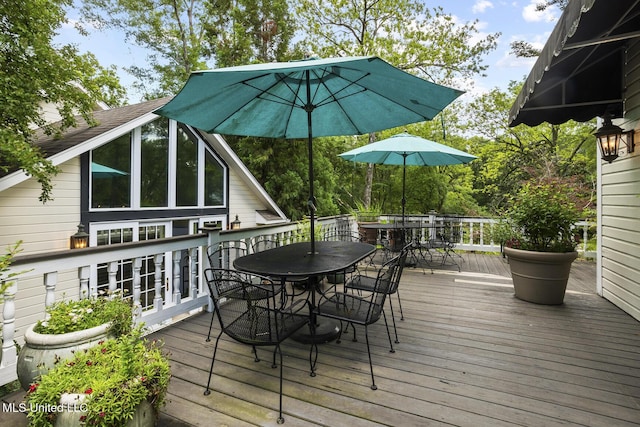 315 N St, Lexington, MS 39095 - wooden deck featuring outdoor dining space