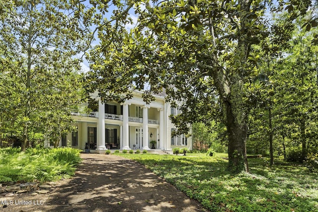 315 N St, Lexington, MS 39095 - neoclassical home with a porch and a balcony