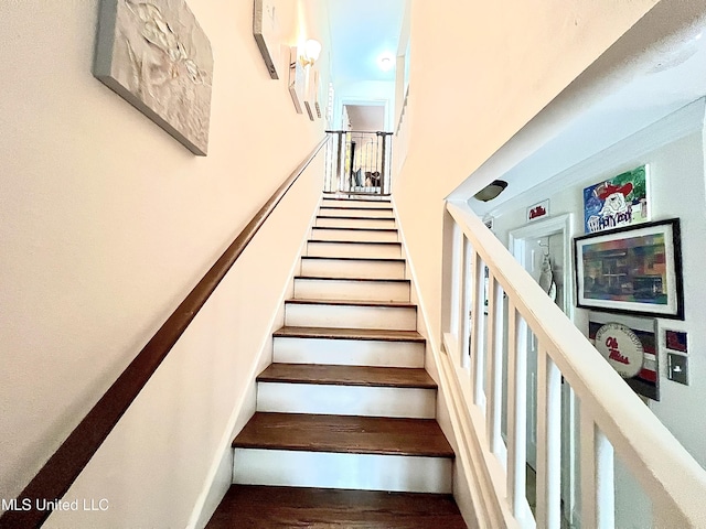 291 Highpoint Dr Unit 291, Diamondhead, MS 39525 - stairway with wood finished floors