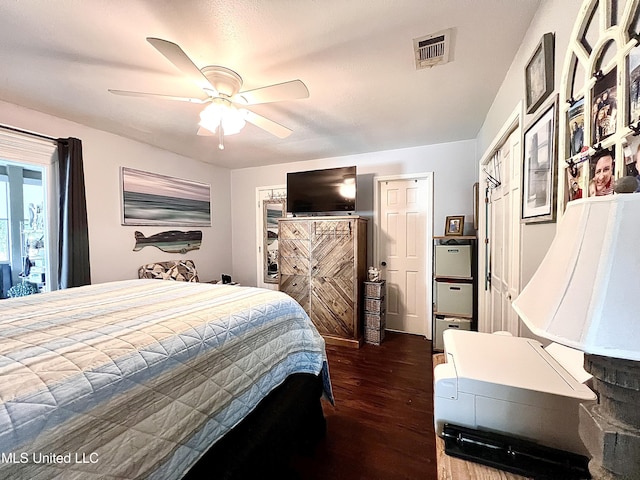 291 Highpoint Dr Unit 291, Diamondhead, MS 39525 - bedroom featuring wood finished floors and ceiling fan