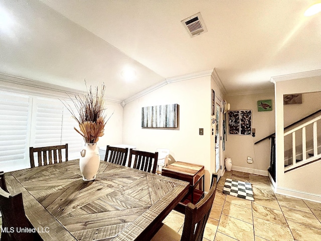 291 Highpoint Dr Unit 291, Diamondhead, MS 39525 - dining room featuring crown molding and lofted ceiling