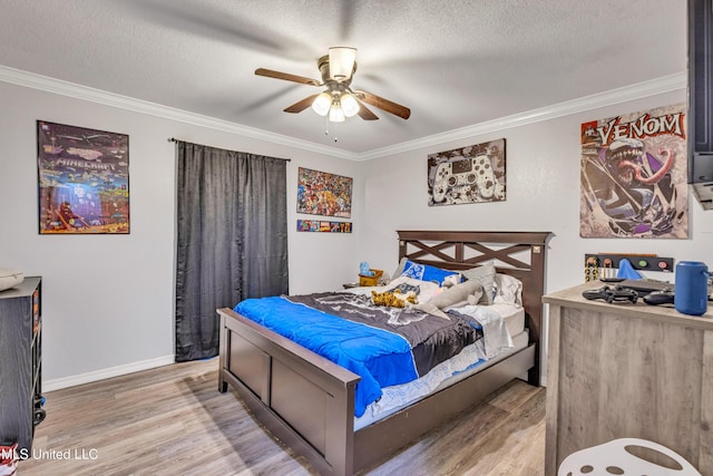 bedroom featuring a textured ceiling, ceiling fan, crown molding, and hardwood / wood-style floors