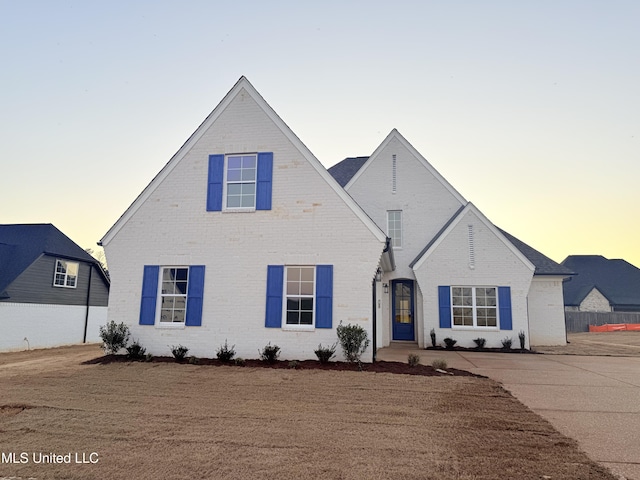 view of front of property with brick siding