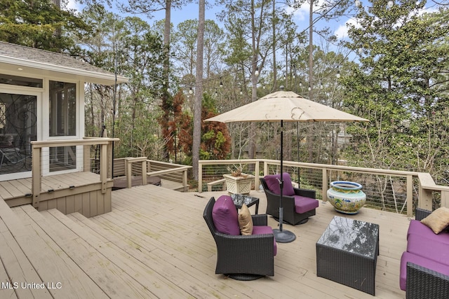 wooden terrace featuring an outdoor living space