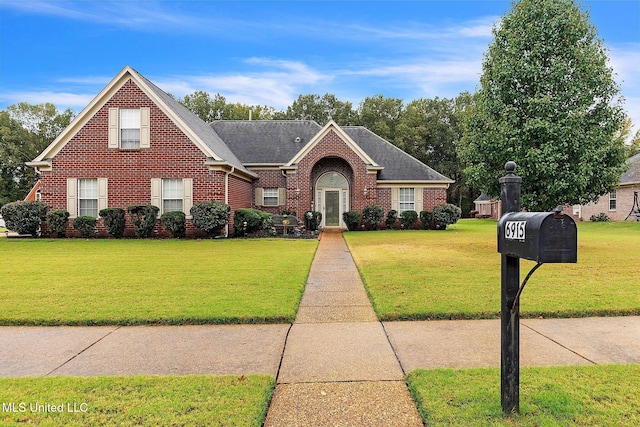 view of front of home with a front lawn