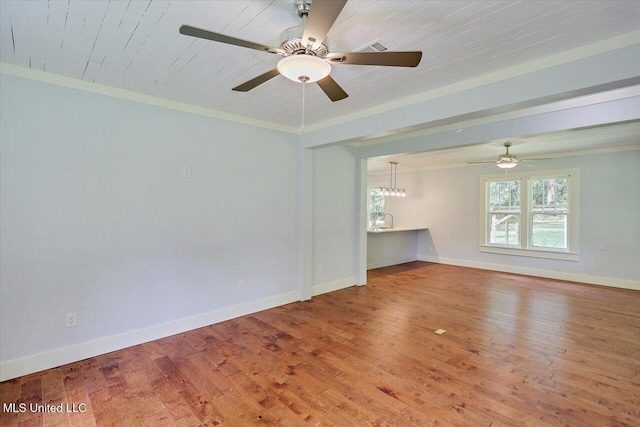 873 SCR 142, Morton, MS 39117 - unfurnished room with wood finished floors, a ceiling fan, ornamental molding, and a chandelier