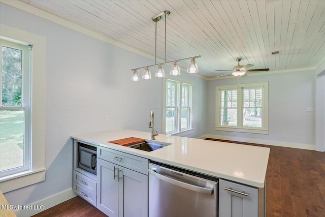 873 SCR 142, Morton, MS 39117 - kitchen with appliances with stainless steel finishes, a peninsula, ornamental molding, wood ceiling, and light countertops