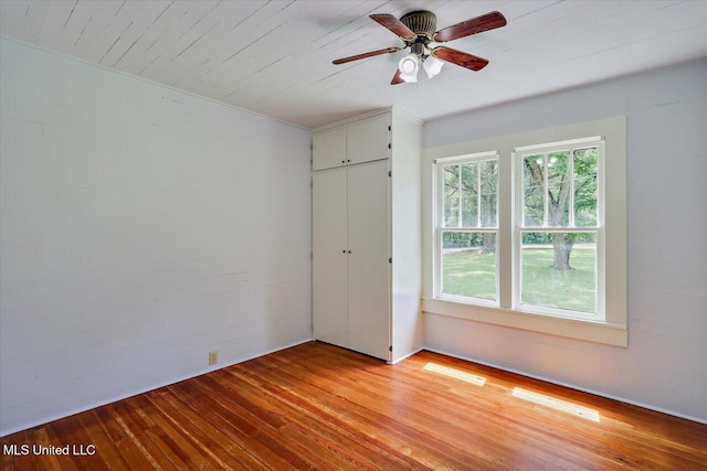 873 SCR 142, Morton, MS 39117 - unfurnished bedroom with light wood-style floors, a closet, and a ceiling fan