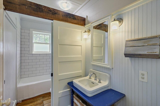 873 SCR 142, Morton, MS 39117 - full bath with wood finished floors, vanity, wooden walls, and bathtub / shower combination