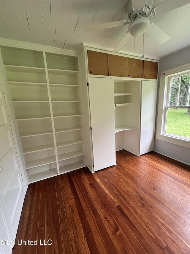 873 SCR 142, Morton, MS 39117 - unfurnished bedroom with dark wood-style flooring, a closet, and ceiling fan