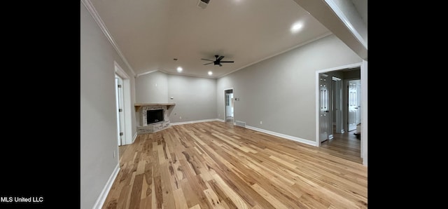 unfurnished living room with crown molding, visible vents, baseboards, a ceiling fan, and light wood-style flooring