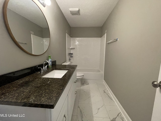 full bathroom with a textured ceiling, baseboards, vanity, toilet, and marble finish floor