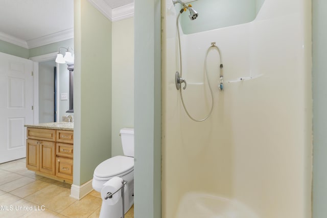 bathroom with a shower, ornamental molding, toilet, and tile patterned floors