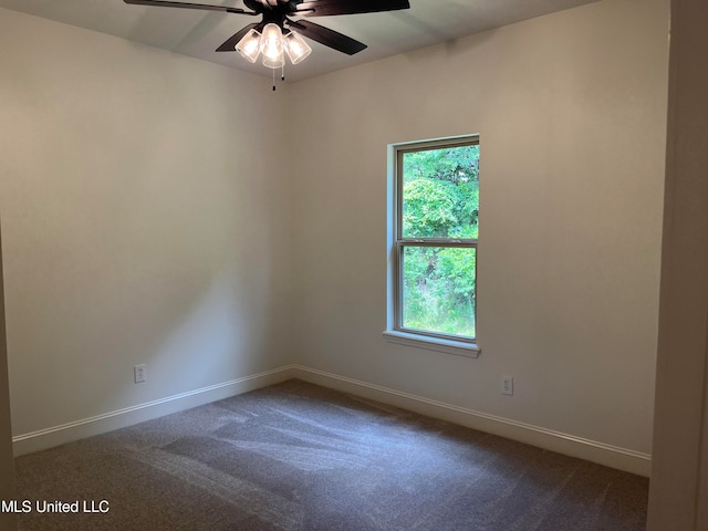 unfurnished room with carpet floors, a healthy amount of sunlight, and ceiling fan