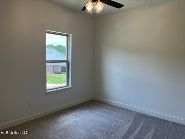 empty room with carpet and ceiling fan