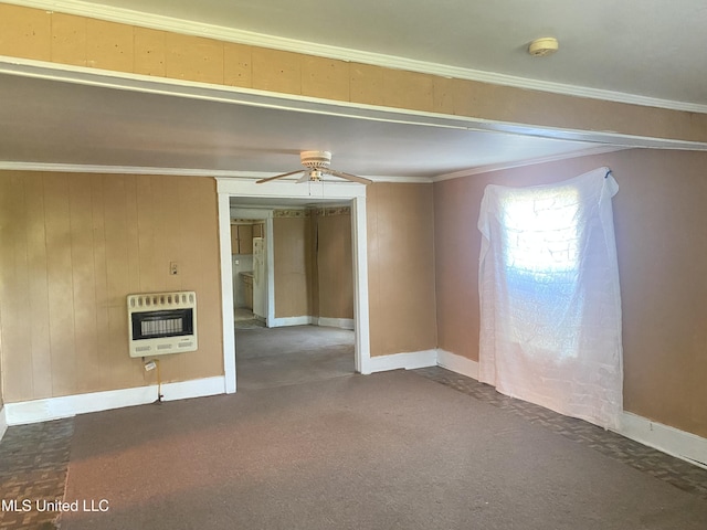 810 S Edwards Ave, Clarksdale, MS 38614 - carpeted empty room featuring ceiling fan, baseboards, ornamental molding, and heating unit