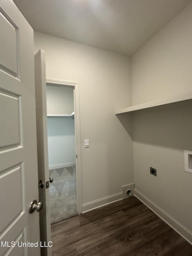 laundry area with dark wood-type flooring and hookup for an electric dryer