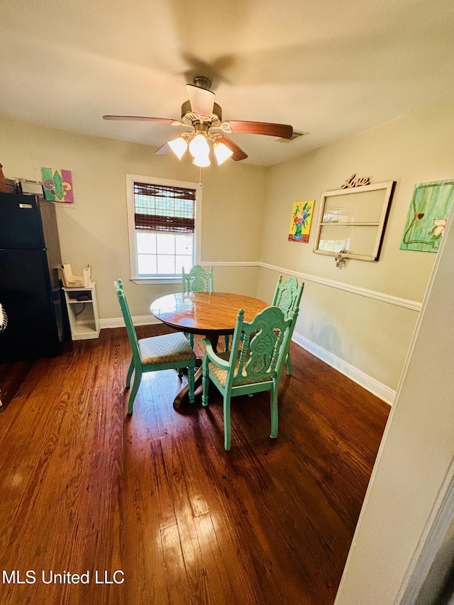 4466 Beatline Rd, Long Beach, MS 39560 - dining space with baseboards, ceiling fan, visible vents, and wood finished floors