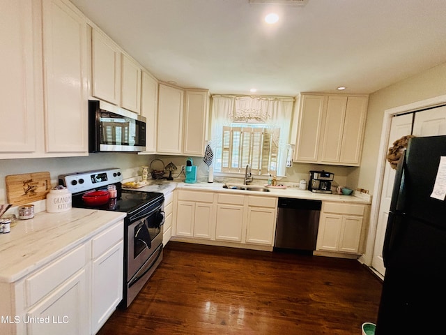 4466 Beatline Rd, Long Beach, MS 39560 - kitchen featuring a sink, light countertops, stainless steel appliances, recessed lighting, and dark wood-style floors