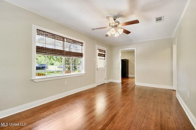4466 Beatline Rd, Long Beach, MS 39560 - unfurnished room featuring visible vents, a ceiling fan, crown molding, and wood finished floors