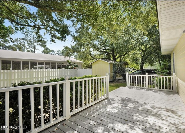 4466 Beatline Rd, Long Beach, MS 39560 - deck with a shed, an outbuilding, and fence