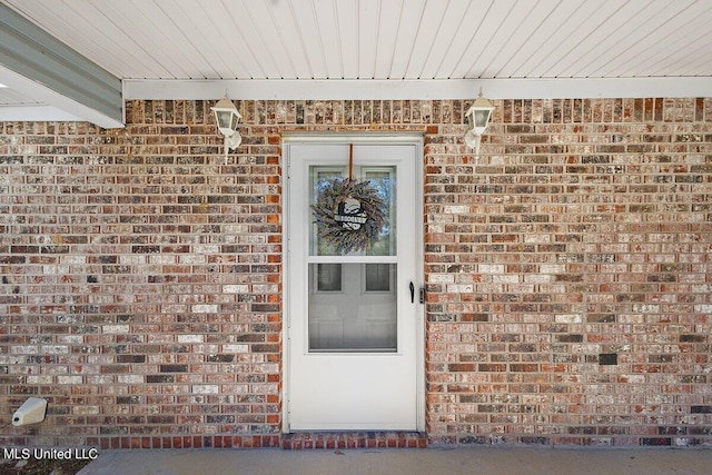 1085 Thomas Dr, Raymond, MS 39154 - view of exterior entry featuring brick siding