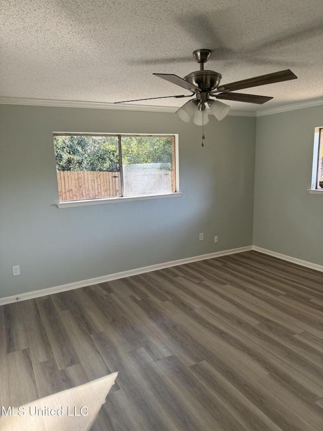 unfurnished room with dark wood-type flooring, ceiling fan, ornamental molding, and a textured ceiling