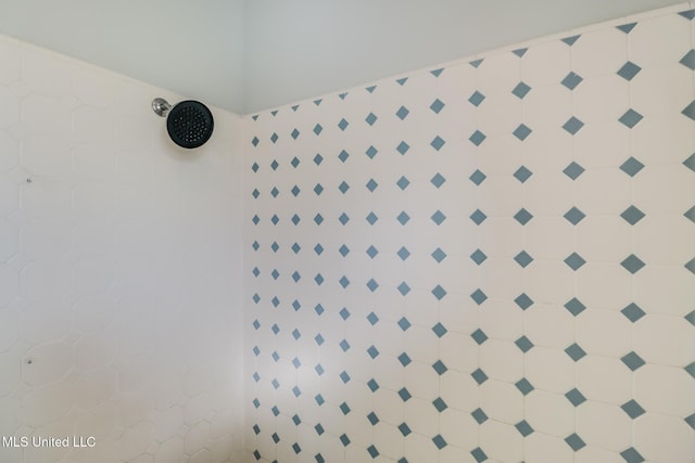 interior space with a tile shower