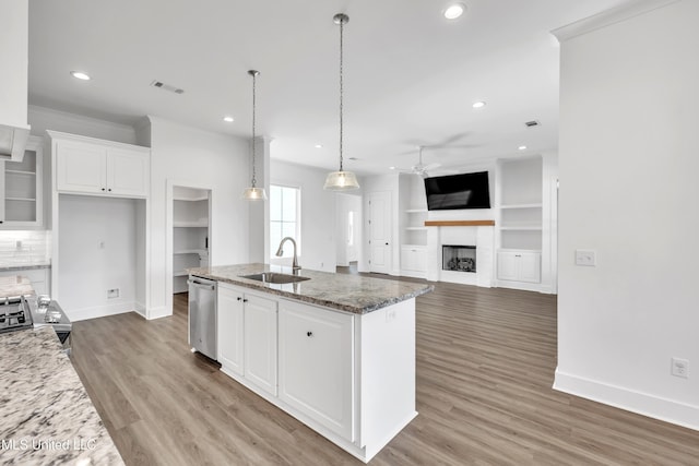 202 Crestwood Pl, Madison, MS 39110 - kitchen featuring a ceiling fan, stainless steel dishwasher, white cabinets, a fireplace, and recessed lighting