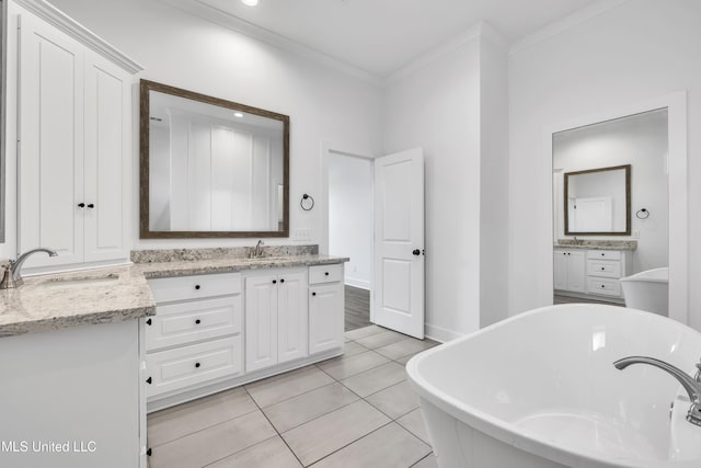 202 Crestwood Pl, Madison, MS 39110 - full bath with vanity, a freestanding bath, ornamental molding, and tile patterned floors