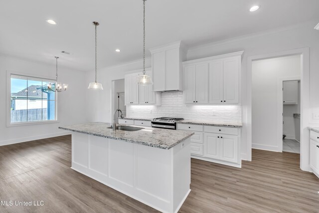 202 Crestwood Pl, Madison, MS 39110 - kitchen featuring backsplash, recessed lighting, light wood finished floors, white cabinets, and crown molding