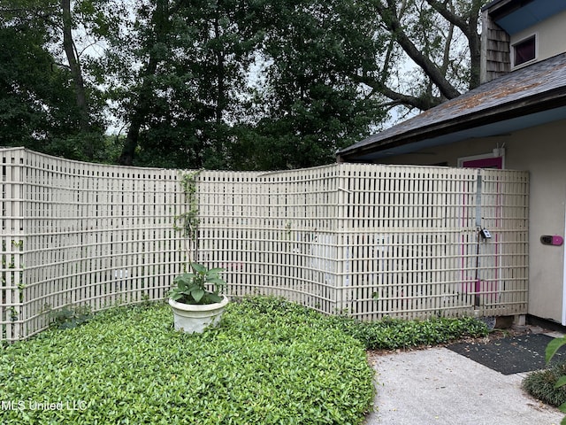828 Oakleigh Ave Unit 15, Gulfport, MS 39507 - exterior details with a fenced backyard and stucco siding