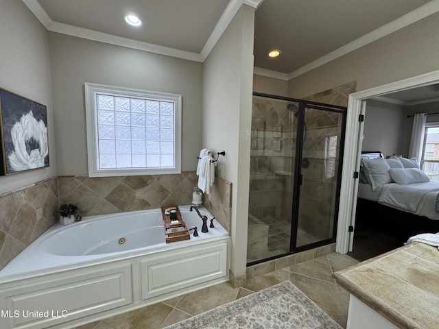 bathroom with tile patterned floors, ornamental molding, and separate shower and tub