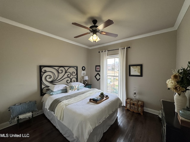 bedroom featuring crown molding, dark hardwood / wood-style floors, and ceiling fan