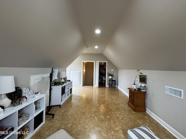 bonus room with vaulted ceiling