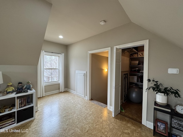 bonus room featuring vaulted ceiling