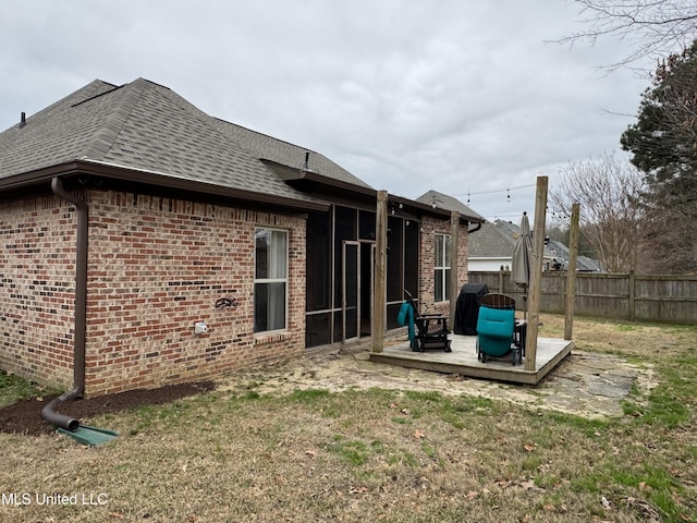 exterior space featuring a patio and a lawn