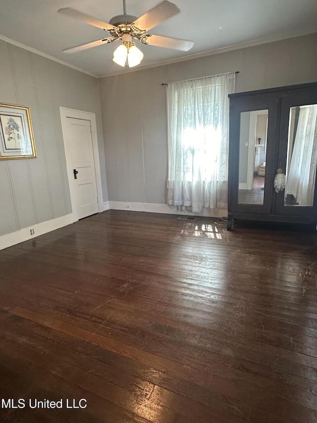 209 S Jackson St, Crystal Springs, MS 39059 - unfurnished room with hardwood / wood-style flooring and ornamental molding