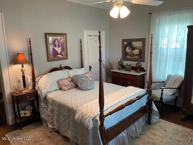 bedroom with light hardwood / wood-style flooring and ceiling fan