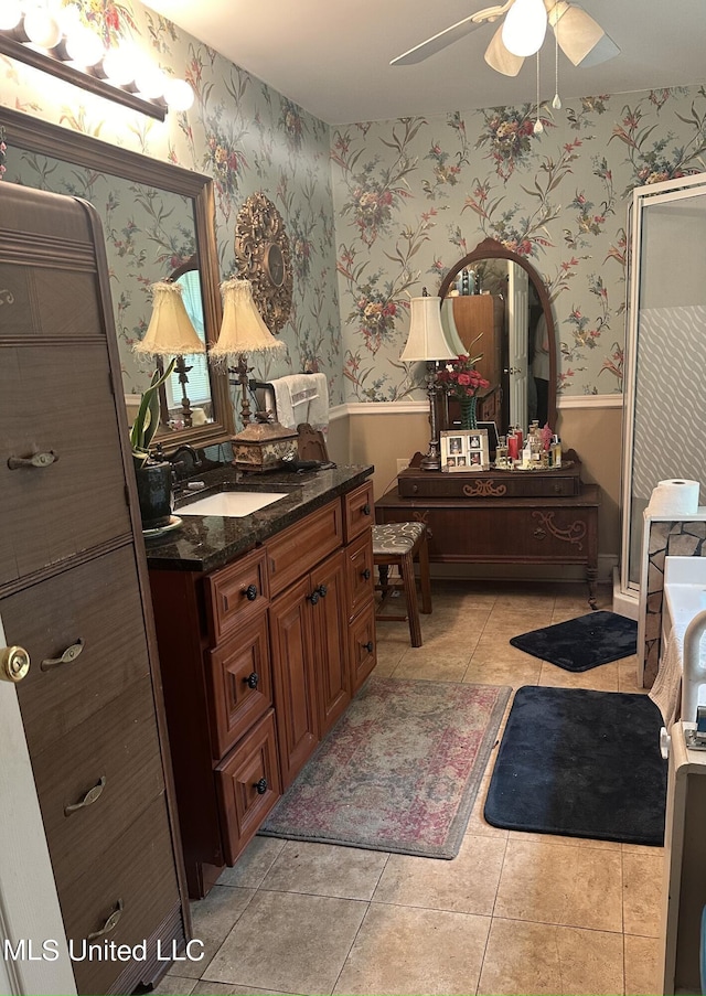 bathroom featuring vanity, ceiling fan, tile patterned floors, and an enclosed shower