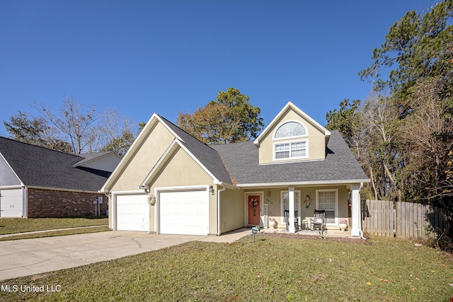 view of front facade featuring a garage, a porch, and a front yard