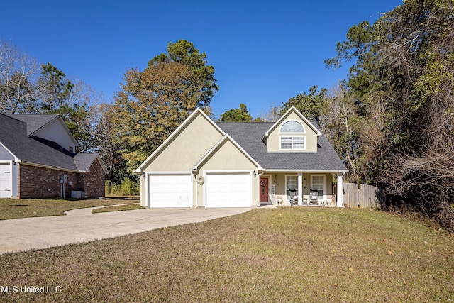 view of front property featuring a porch, a front yard, and cooling unit