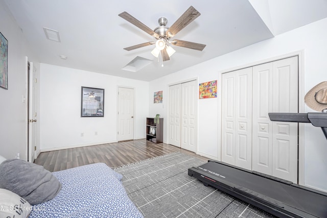 exercise room featuring hardwood / wood-style flooring and ceiling fan